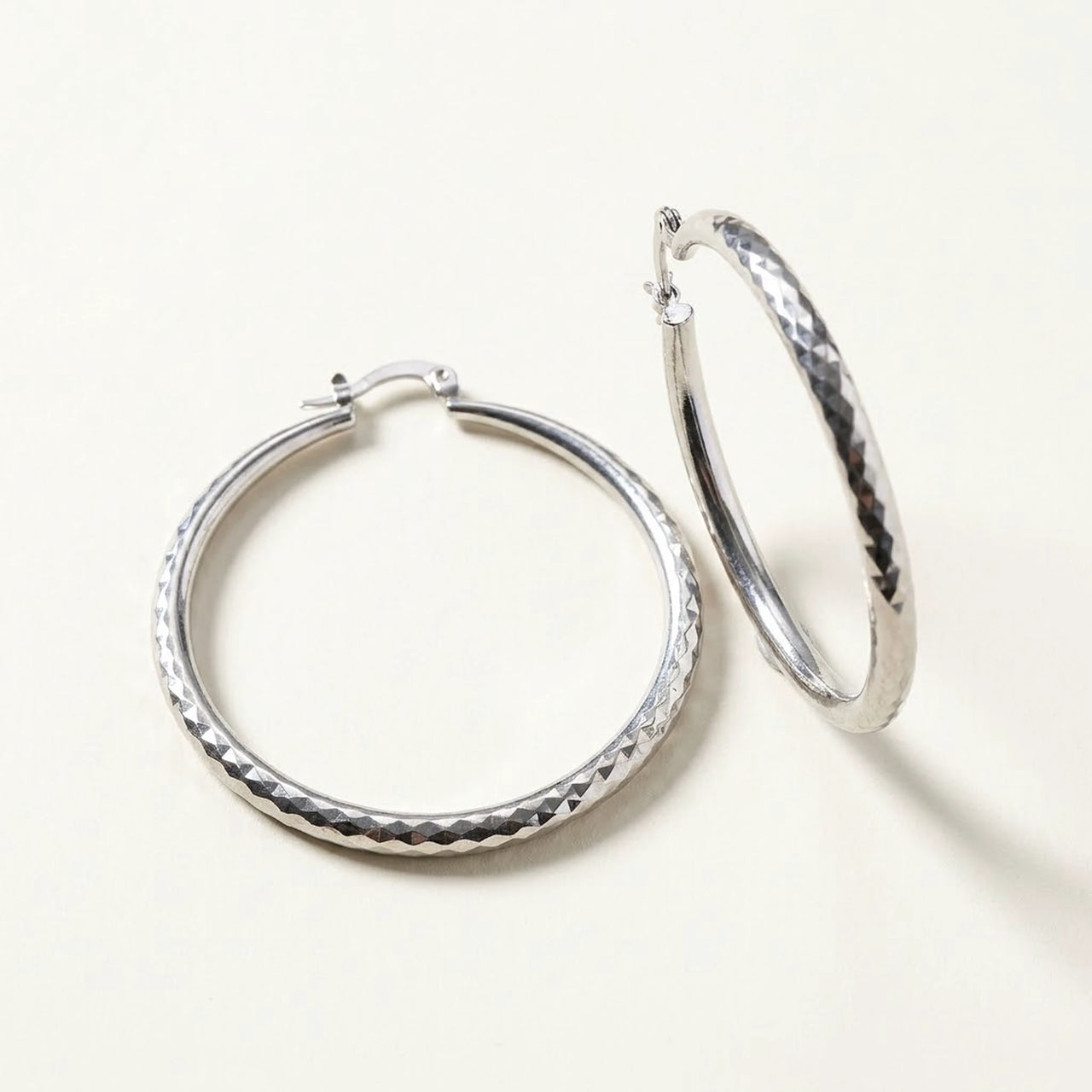 Diamond Cut Statement Hoops in Silver, product photo | SKU: 41009-silver