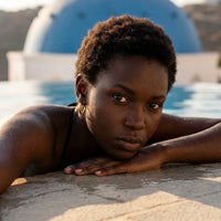 Thumbnail for Everyday Waterproof Hoops in Gold, worn by a pool in Santorini | SKU: 41001-gold