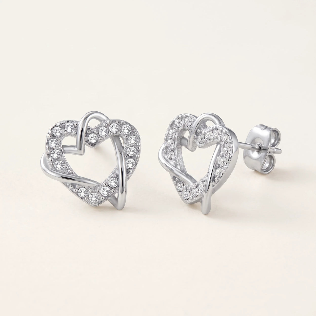 Silver heart earrings — product photo on a white background, silver | SKU: 4478648-platinum-plated-clear
