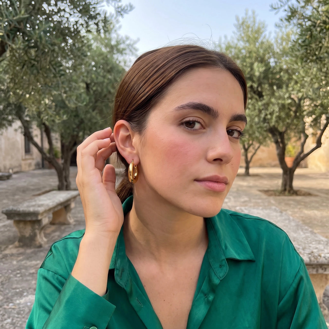 The Shiny, gold earrings — worn gesture | SKU: lesbrillantes