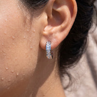 Thumbnail for Huggie hoop earrings — close-up of the details, silver | SKU: 22023999-rhodium