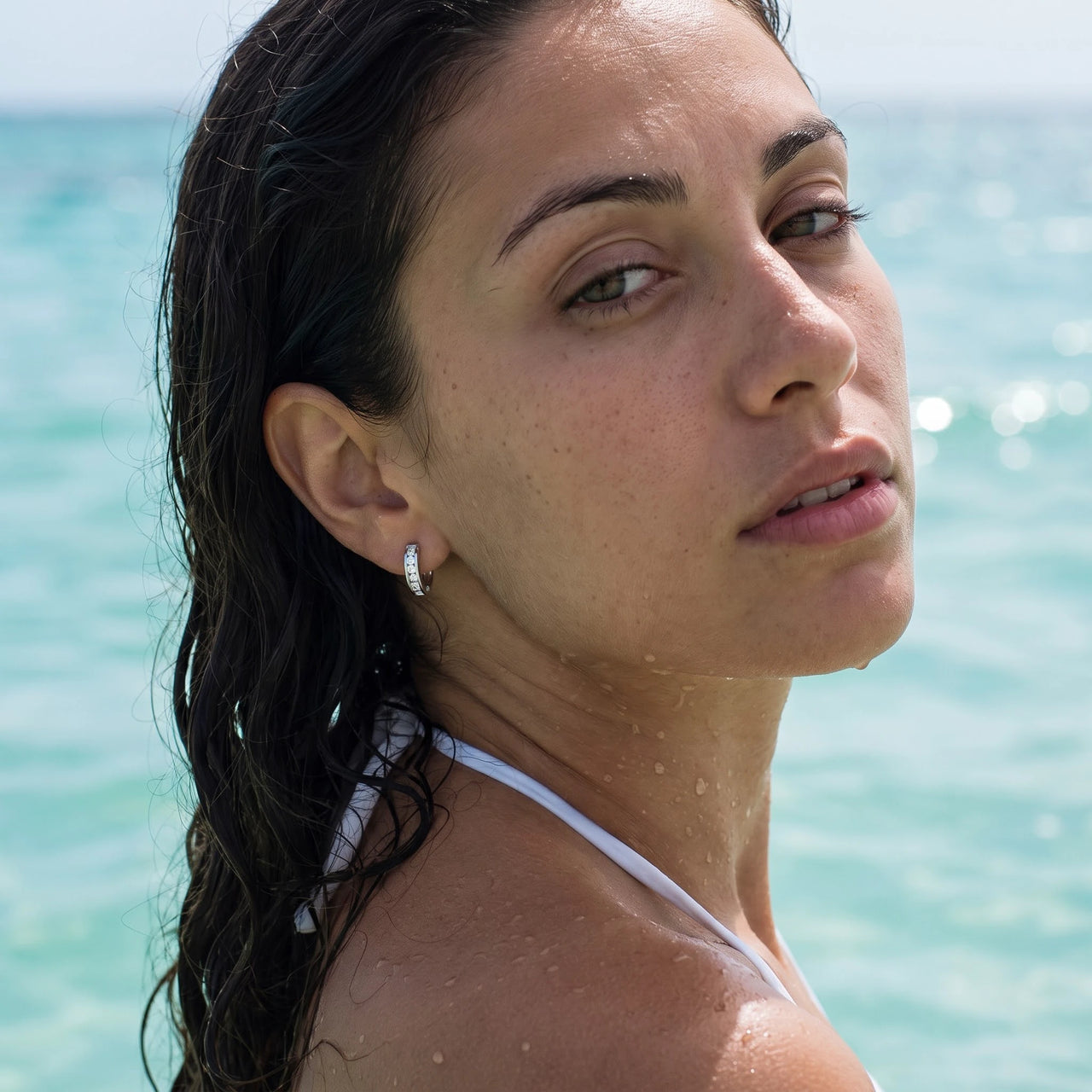 Silver huggie earrings — worn in the water, waterproof, silver | SKU: 22023999-rhodium