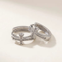 Thumbnail for Pave Cross Huggie Hoops in Silver, product photo | SKU: 41006-silver