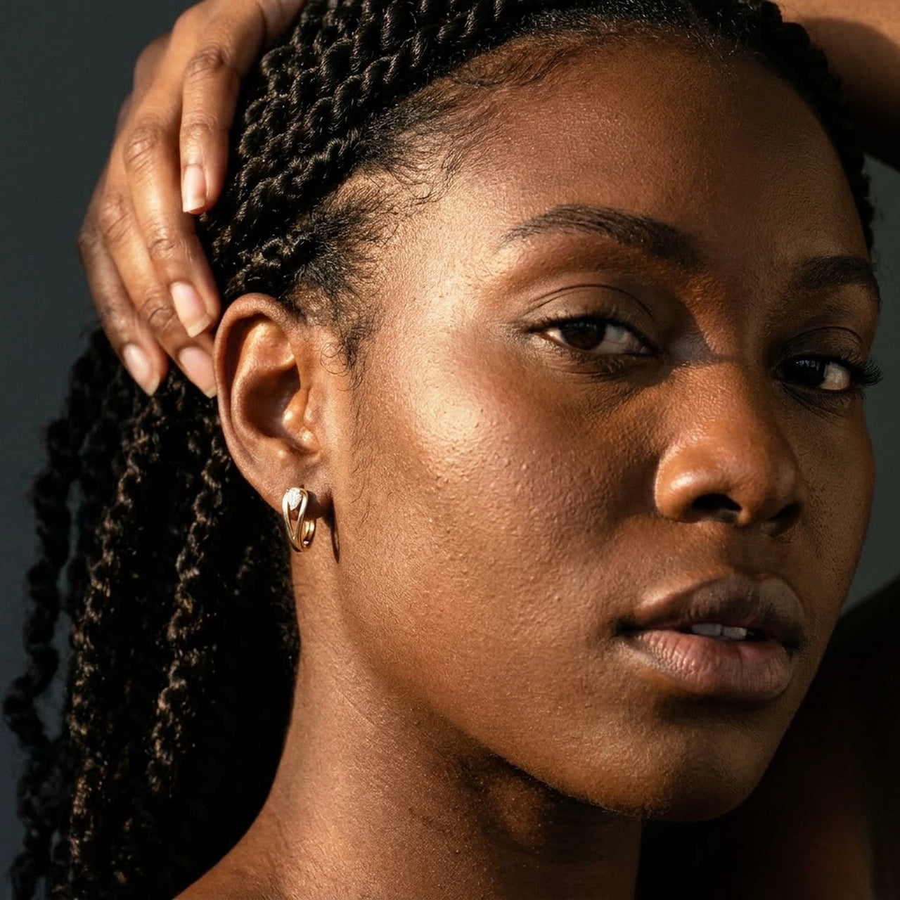Pear Crystal Huggie Hoops in Gold, studio portrait | SKU: 41007-gold
