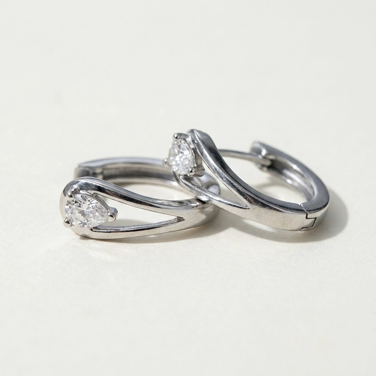 Pear Crystal Huggie Hoops in Silver, product photo | SKU: 41007-silver