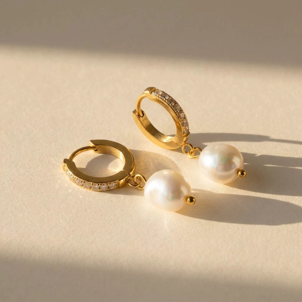Pearl Drop Huggie Hoops in Gold, product photo | SKU: 41003-gold