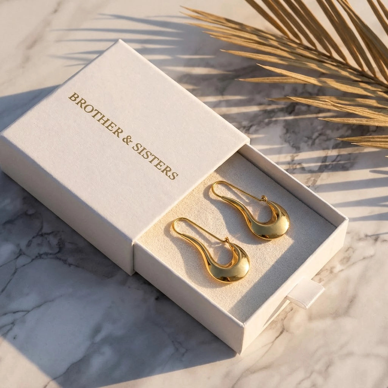 Sculpted Crescent Drops in Gold, in the gift box | SKU: 41008-gold