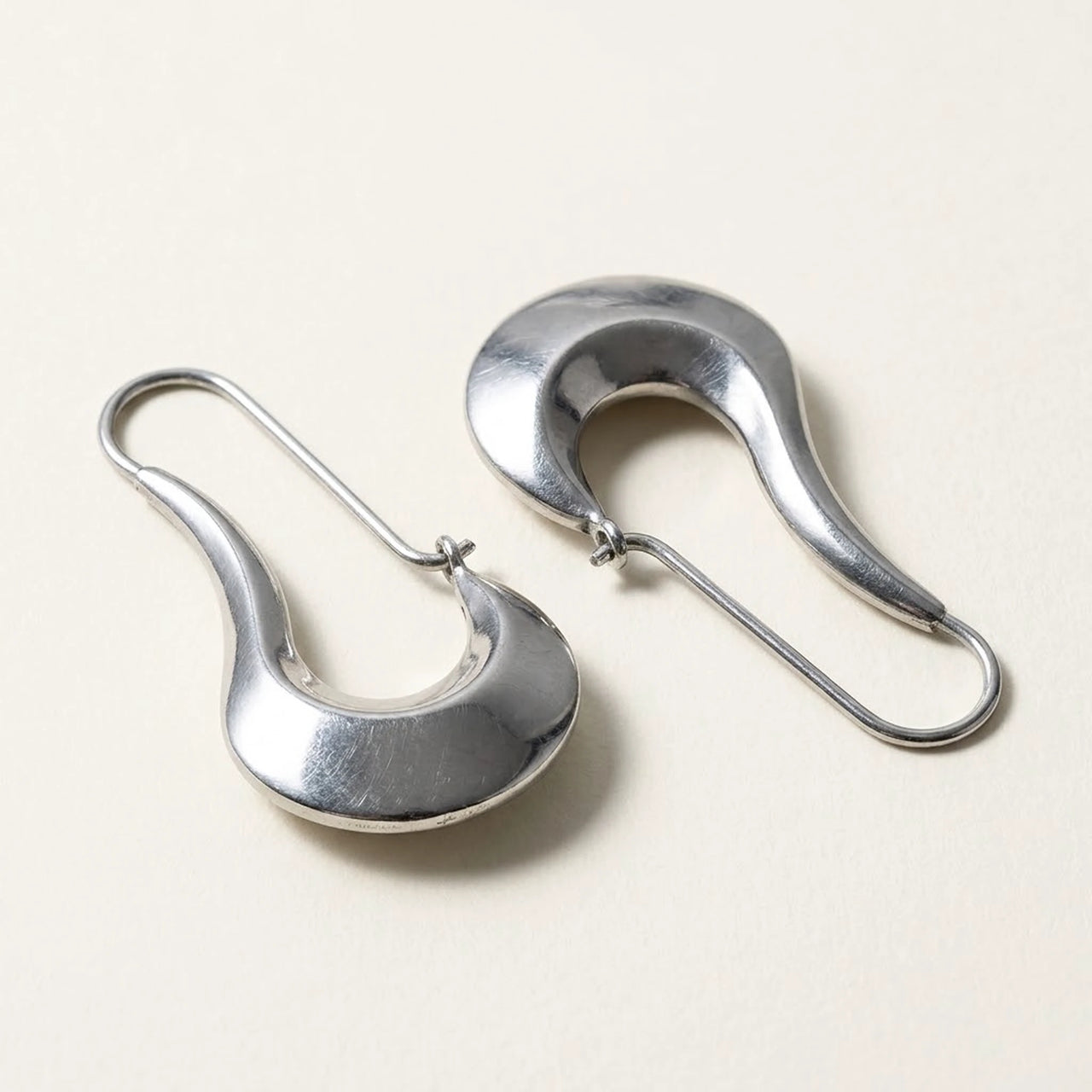 Sculpted Crescent Drops in Silver, product photo | SKU: 41008-silver
