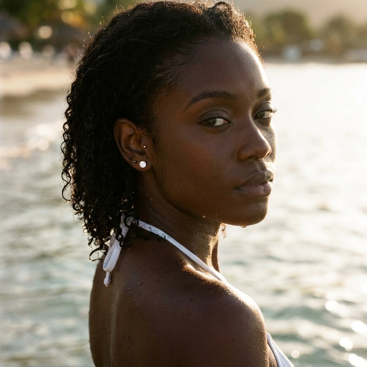 Solitaire Crystal Studs in Gold, worn in the sea, wet skin | SKU: 41010-gold